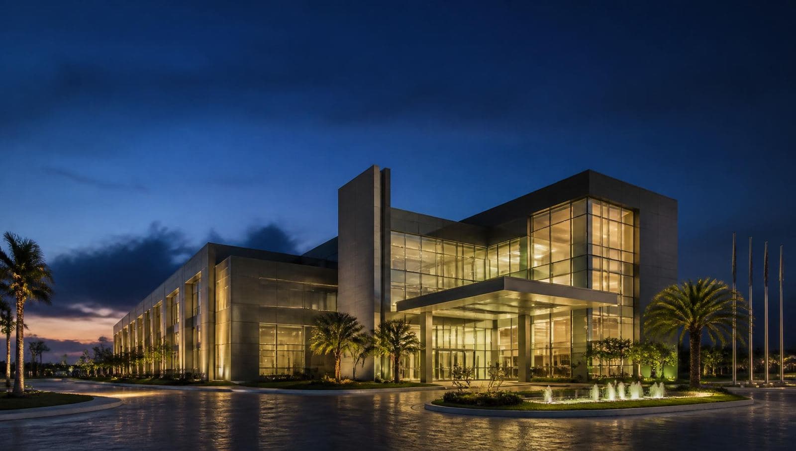 Corporate headquarters building at dusk